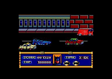 Batman (Amstrad CPC) screenshot: Stage 2: Avoid traffic and reach the BatCave within the time limit