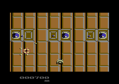Master Blaster (Commodore 64) screenshot: Ground defences to destroy