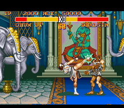 Street Fighter II Turbo (SNES) screenshot: Chu-Li's high kick was connected in Dhalsim's face: an accurate hit!