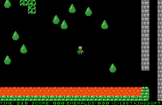 Emerald Mine (Amiga) screenshot: Acid rain, baby! A hot bath isn't recommended, that slimy green stuff also slowly spreads all across the map. So better hurry up.