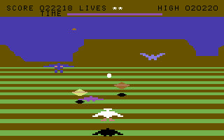 Mega Hawk (Commodore 64) screenshot: Flying over a planets surface