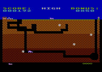 Anteater (Atari 8-bit) screenshot: Anteater in tunnel, ant on the surface