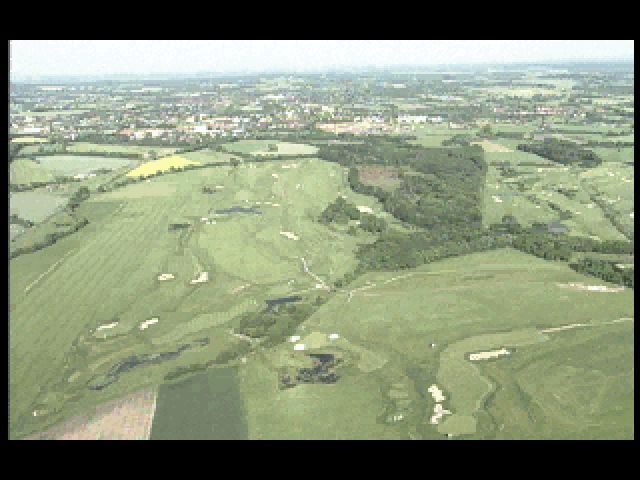 PGA European Tour (DOS) screenshot: ... a video. This is a fly over that's followed by some on-course shots while the commentary continues with the course's recent history ( as at 1995/6)