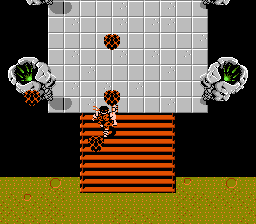 Ikari Warriors II: Victory Road (NES) screenshot: Flaming statues and hearts galore. I must be getting close.